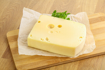 Maasdam cheese over the board