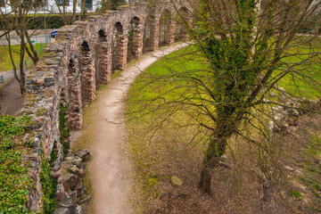 Nice aerial view of the artificial ruins of the Roman water aqueduct by Nicolas de Pigage in the famous English landscape garden of Schwetzingen Palace in Baden-Württemberg, Germany.