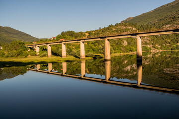 bridge over the lake with wonderful reflection