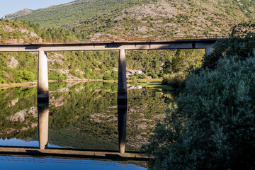 bridge over the lake with wonderful reflection