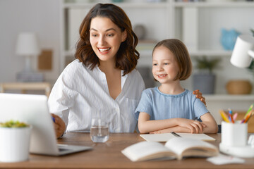 Fototapeta premium Girl doing homework or online education.