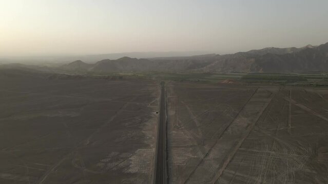 Pan American Highway runs directly past several Nazca geoglyphs in Peru
