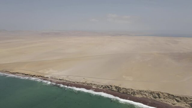 In Paracas National Reserve, Pacific ocean meets endless desert sand