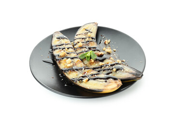 Plate with grilled banana isolated on white background