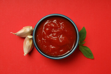 Concept of spicy sauce with Adjika, top view