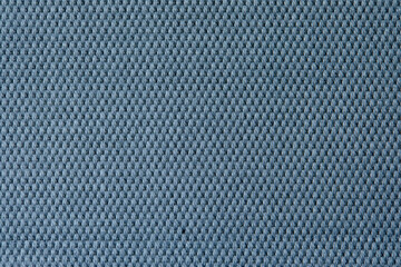 Knitted texture. Texture of jacquard fabric with gray blue geometric pattern. Crochet mosaic pattern.