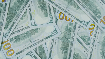 Many dollar are arranged around the edges of the image as a frame. Money create pattern, make design shape picture. Top view, flat lay. Create pattern round circle, make design shape picture.