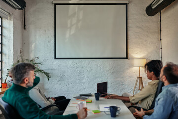 Group of business colleagues in a boardroom meeting