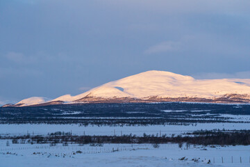 Snow covered mountains in Dovrefjell. Norway