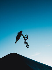 Fototapeta na wymiar BMX park high Jump Action Sport 
