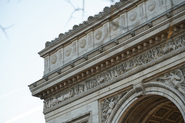 Arch of Triumph building from Paris, France, during a beautiful spring sunrise. Photo taken from Champs Elysee boulevard. Landmarks of France.