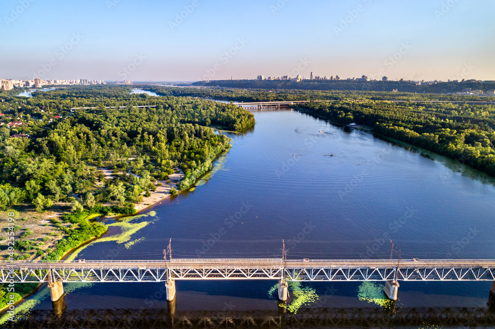 Poster petrovsky railway bridge across the dnieper in kiev, ukraine before the war with russia