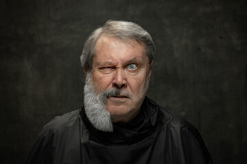 Obraz premium Collage made of portrait of serious grey-bearded senior man looking at camera isolated on dark vintage background. Fashion, beauty concept