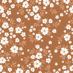 Fototapeta premium Seamless vintage pattern. White flowers. Brown background. vector texture. fashionable print for textiles, wallpaper and packaging.