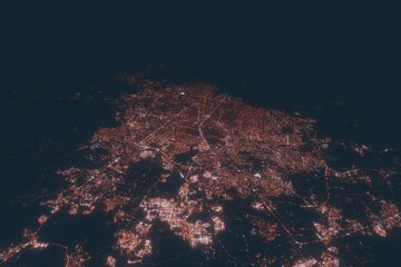 Fototapeta na wymiar Guadalajara aerial view at night. Top view on modern city with street lights