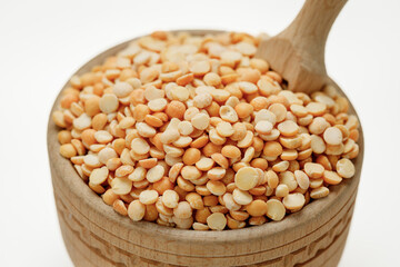 Pea groats in bowls and bags isolated on a white background. High quality photo