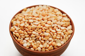 Pea groats in bowls and bags isolated on a white background. High quality photo