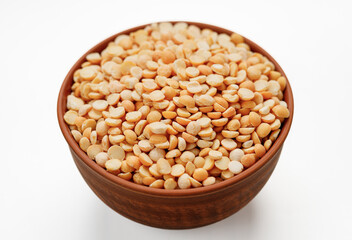 Pea groats in bowls and bags isolated on a white background. High quality photo