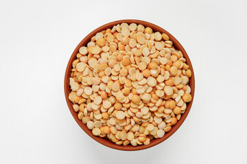 Pea groats in bowls and bags isolated on a white background. High quality photo