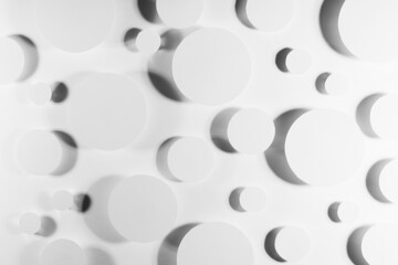White paper circles as energy abstract pattern in shining hard light with soft shadows, reflection, glare, top view. Simple bright modern background in future minimalistic style.
