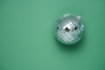 disco ball on green background. Fun nature concept and eco-friendly design