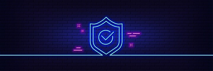 Neon light glow effect. Approved shield line icon. Accepted or confirmed sign. Protection symbol. 3d line neon glow icon. Brick wall banner. Approved shield outline. Vector