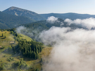 Morning fog in the Ukrainian Carpathians. Aerial drone view.