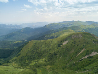 Obraz premium High mountains of the Ukrainian Carpathians in cloudy weather. Aerial drone view.