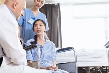 Doctors and medical students examining sick people
