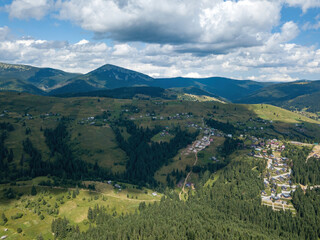 Green Ukrainian Carpathians mountains in summer. Aerial drone view.