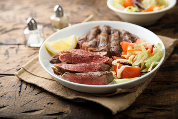 Grilled beef steak with vegetable salad