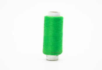Forest Green Colorful yarn on spool isolate on white background
