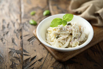 Homemade squid salad with capers