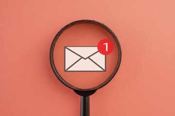 New email,message,unread email,nontification concept.,View through a magnifying glass on 1 new...