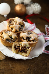 Traditional festive mince pies on a plate	