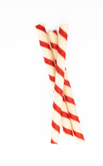 red and white color wafer stick on white background , top view