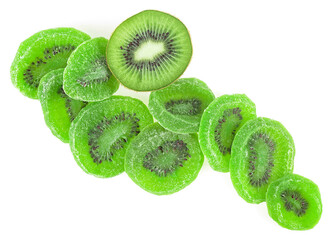 Slices of dried kiwi and fresh kiwi fruit isolated on a white background, top view. Dried candied...