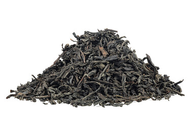 Dry black tea leaves pile isolated on a white background. Ceylon black tea.
