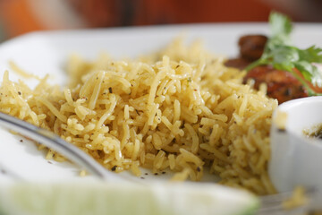 cooked rice in a bowl on table, close up,
