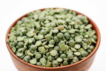 Green pea groats isolated on a white background. High quality photo