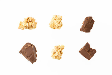 granola pieces on a white background