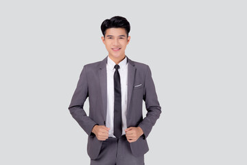 Portrait young asian businessman in suit smiling with confident and friendly isolated on white background, business man smart with success, manager or executive with handsome and leadership.