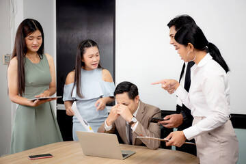 Employee angry and bullying boss while stress and pressure at the office, team businesspeople upset with manager during meeting conference in corporate, conflict and failure, business concept.