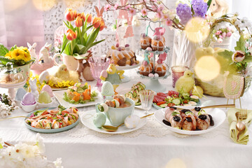 Easter table with traditional dishes and decorations