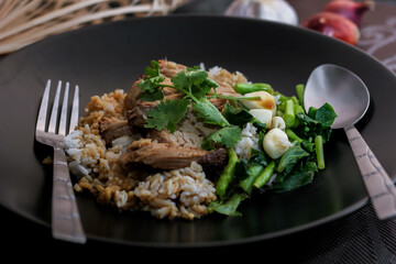 Stewed pork leg on rice, Thai food and street food that Thai people like to eat. or what we call 