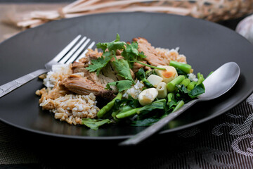 Stewed pork leg on rice, Thai food and street food that Thai people like to eat. or what we call 