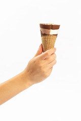 woman holding ice cream cone on white background
