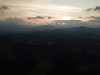 Obraz premium Sunset over the mountains in the Ukrainian Carpathians. Evening. Aerial drone view.