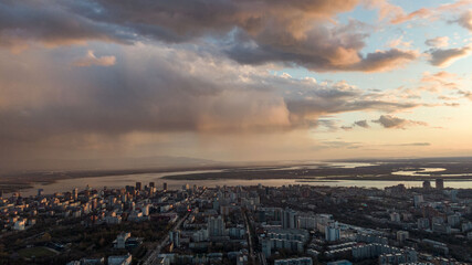 Khabarovsk city top view sunset beautiful clouds in the rain