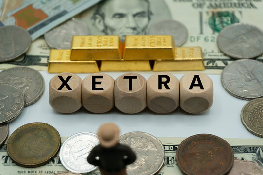 Xetra was one of the first global electronic trading systems.it offers trading in stocks, funds, bonds, warrants, and commodities contracts.The word is written on  money and gold background.